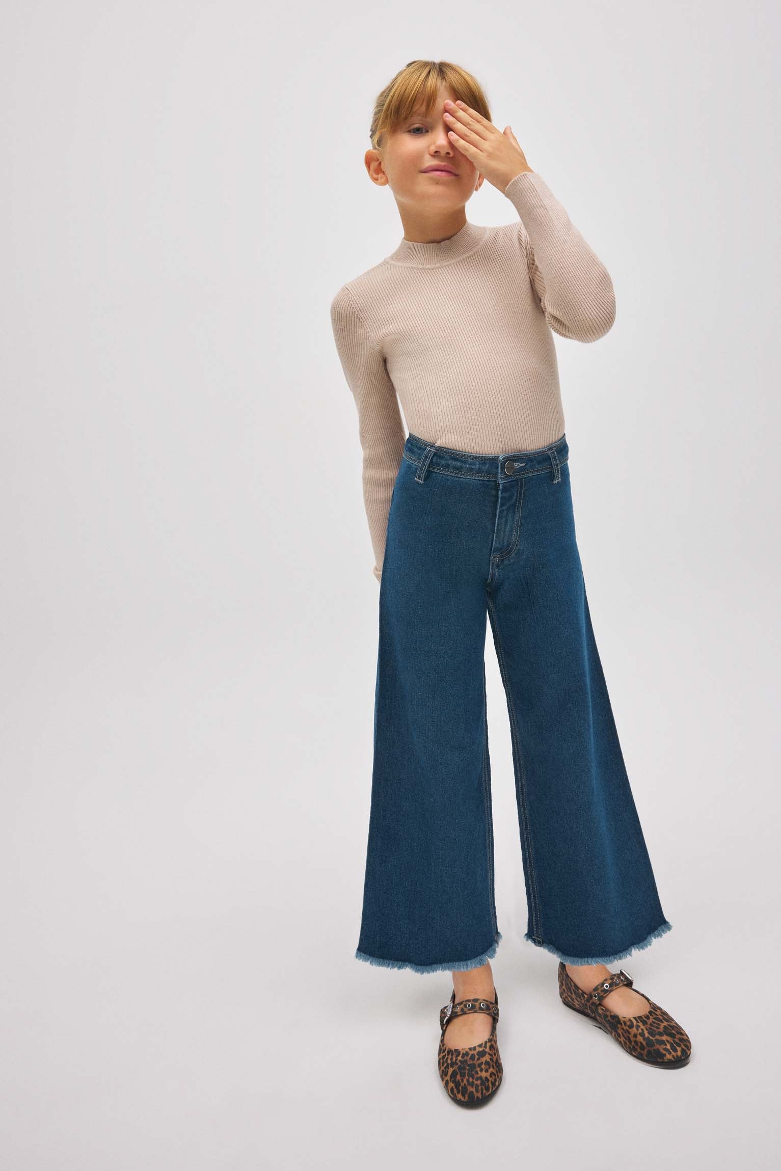 Pantaloni da bambina in denim blu navy a gamba larga - immagine 2