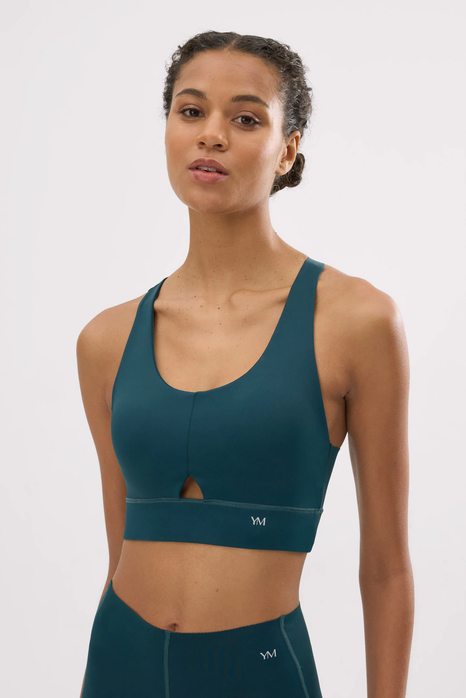 Reggiseno sportivo compressivo con dettaglio ritagliato verde bottiglia - immagine 2