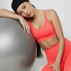 Reggiseno sportivo compressivo Coral con incrocio sulla schiena